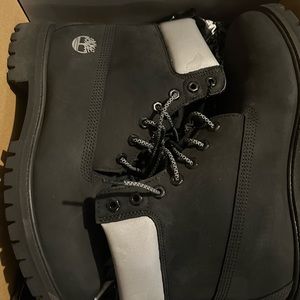 Black and silver Timberland Boots